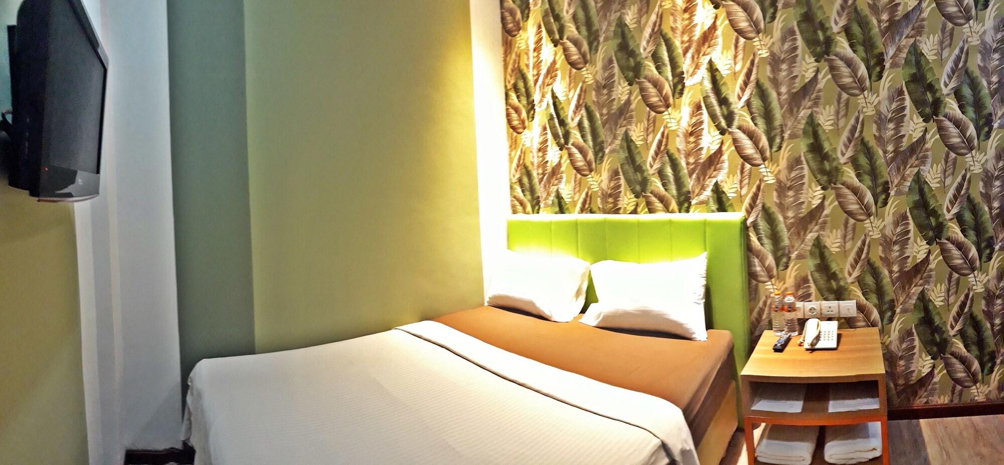 Kama Hotel Medan Buitenkant foto