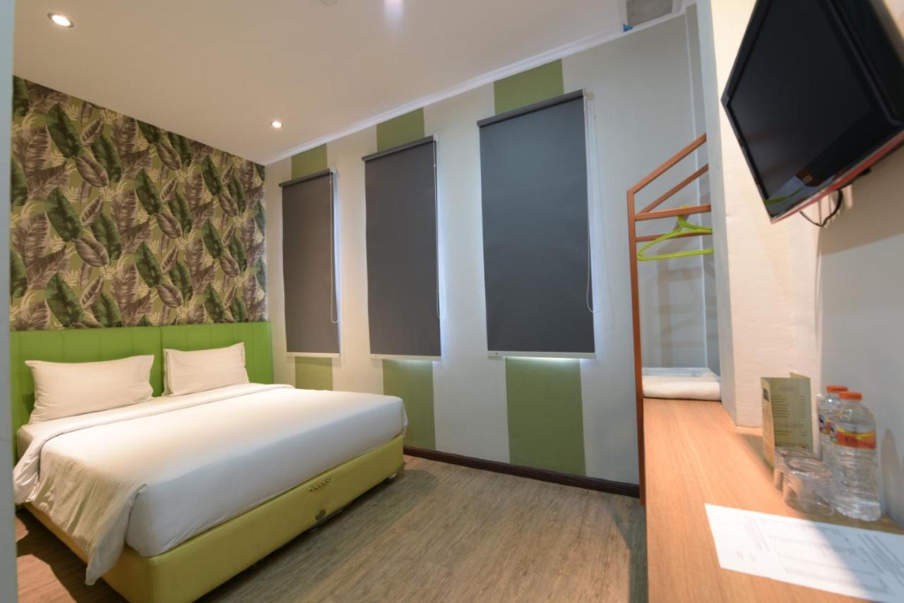 Kama Hotel Medan Buitenkant foto